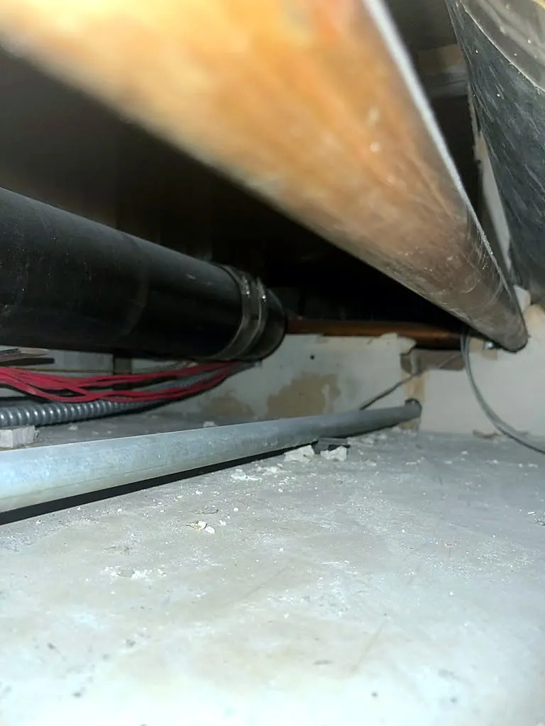 Replaced cast iron drain pipe running above a ceiling in Palo Alto
