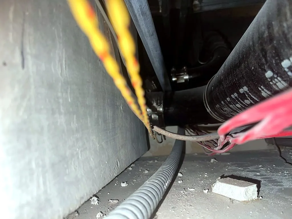 Cleaning out a fully clogged drain line above a ceiling in Palo Alto