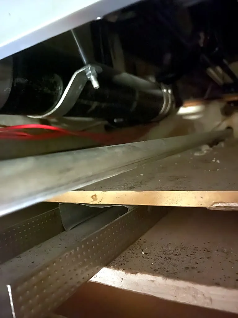 New cast iron drain line installed and supported above a ceiling in Palo Alto